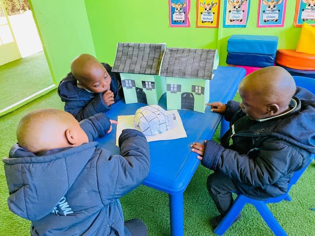 Learners in a play-based classroom activity