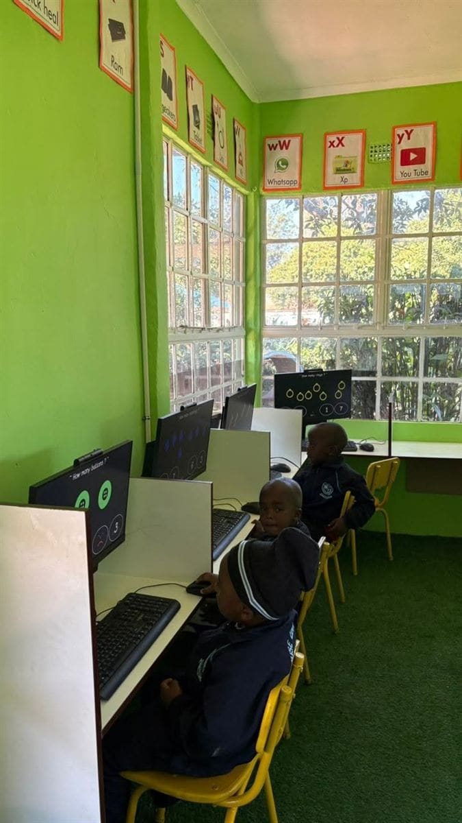Learners at computer stations