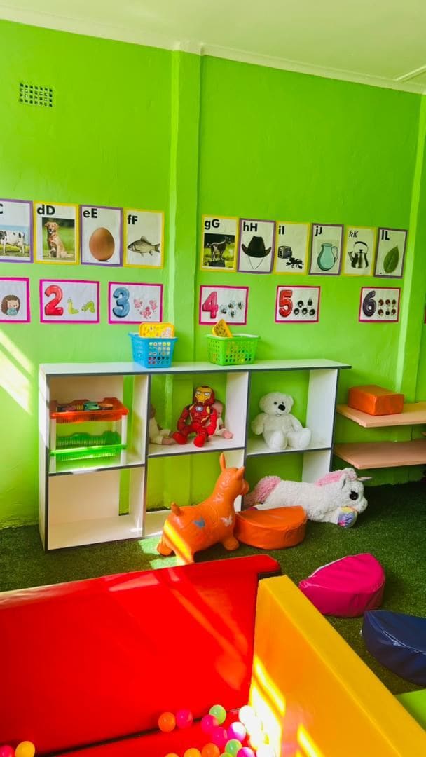 Soft play room with toys and books